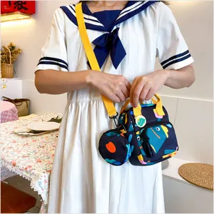 Japanese style canvas crossbody bag with cute print, yellow strap, versatile daily handbag.