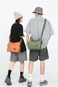 Japanese solid color tooling canvas messenger bag casual crossbody bag for men and women