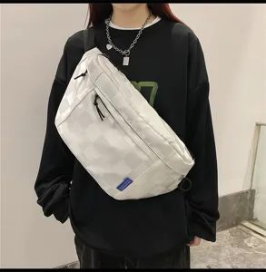 Fashionable large capacity canvas crossbody chest bag for women and men, casual sports style.