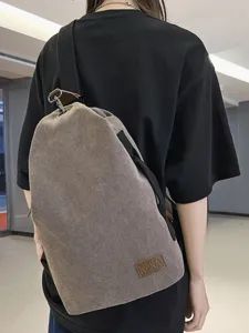 Sac bandoulière rétro en toile pour homme et femme, sac de poitrine décontracté multifonctionnel.