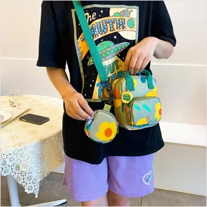 Canvas crossbody bag set with floral pattern, cute shoulder bag and coin purse for daily use.