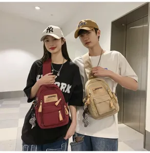 Casual canvas sling backpack for men and women, featuring multi-pocket design and cool street style.