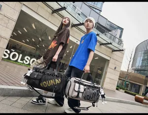 Large capacity travel duffel bag for sports, fitness and short business trips with multiple pockets.