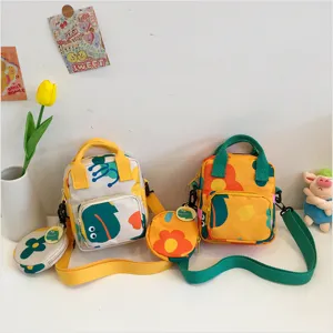 Canvas crossbody handbag set with cute frog and flower print, sweet style, detailed closeup view.