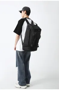 Sac à dos de voyage noir grande capacité sac de sport multifonctionnel pratique.