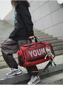 Large capacity travel duffel bag for sports, fitness, and weekend trips. Durable design.