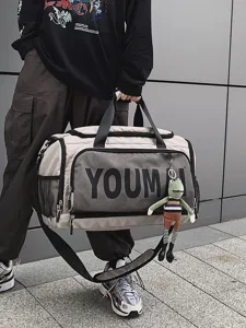 Oversized travel duffel bag for men and women, large capacity gym sports bag with strap.