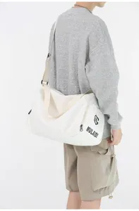 Large capacity duffel bag for gym, yoga, and travel. Durable white crossbody fitness bag.