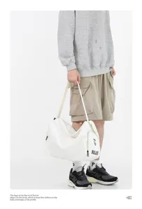 Large capacity white canvas duffel bag, casual shoulder travel bag for men and women fitness.