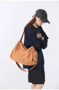 Large capacity yoga fitness bag and travel duffel bag detail view, spacious storage.