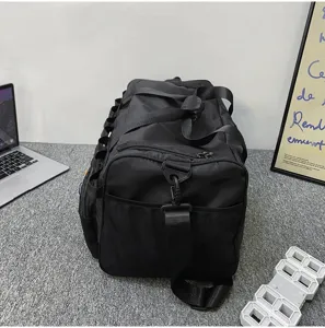 Grand sac de sport noir grande capacité, sac de voyage imperméable pour homme et femme.