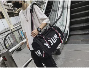 Large capacity black sports duffel bag for travel, gym, and fitness with bold white letters.