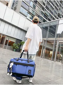 Large capacity travel duffel bag for short trips, students and gym workouts in blue.