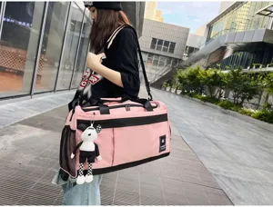 Pink travel duffel bag for women, large capacity gym sports bag, lightweight weekender bag.