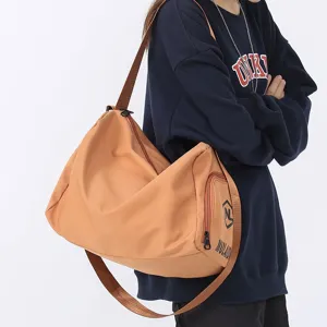 Large capacity duffel bag for yoga, fitness, travel and daily use with shoulder strap.