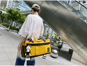Large capacity yellow duffel bag for short travel and gym fitness, portable and durable.