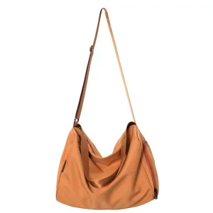 Large capacity casual nylon crossbody shoulder bag for women and travel use daily.
