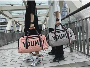 Large capacity travel duffel bag with wet dry separation for gym sports and weekend trips.