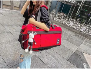 Large capacity travel duffel bag for short trips, sports, and gym use with shoulder strap.