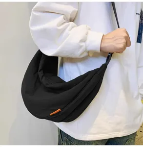 Large capacity black crossbody dumpling bag for casual daily wear, lightweight and stylish.