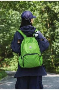 Lightweight waterproof outdoor travel backpack, large capacity casual daypack for hiking sports.
