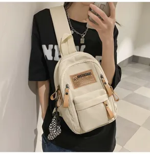 Stylish casual canvas chest bag for women and men, multi-pocket streetwear crossbody backpack.