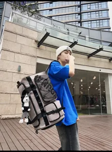 Large capacity travel duffel bag with multiple straps, mesh pockets and stylish streetwear design.