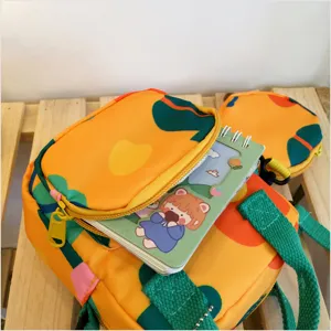 Close-up detail of the Japanese sweet canvas crossbody bag showing texture and front pocket.
