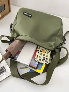 Japanese casual canvas crossbody bag for women and men, large capacity utility messenger bag.