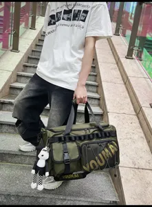 Detailed view of the large capacity tactical sports duffel bag with multi pockets and doll.