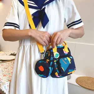 Cute Japanese style canvas crossbody bag with yellow strap, trendy shoulder handbag.