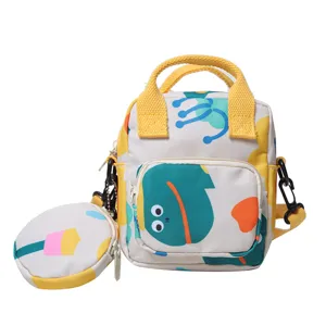 Canvas crossbody bag with yellow handles and cartoon print, cute Japanese style casual handbag.