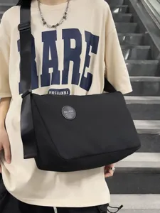 Zwarte canvas schoudertas voor heren en dames, grote casual tas voor reizen en dagelijks gebruik.