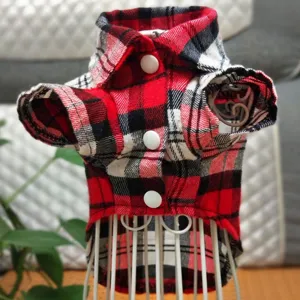 Red and black plaid pet shirt detail view, classic collar with buttons for small dogs.