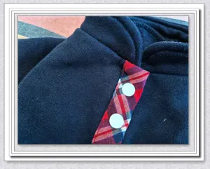 Thickened warm dog cardigan detail, soft fleece pet apparel with stylish plaid placket.