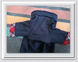 Detailed view of the warm pet dog hoodie in navy blue with stylish plaid cuffs and collar.
