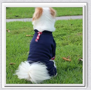 Close-up detail of warm fleece pet dog jumpsuit featuring plaid collar in navy blue.