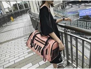 Large capacity pink travel duffel bag for gym, fitness and short trips with wet-dry separation.