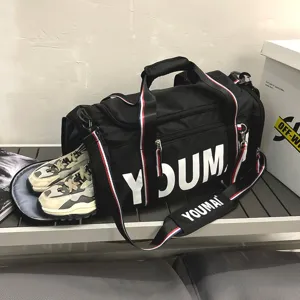 Large capacity gym duffel bag with separate shoe compartment for travel and fitness sports.