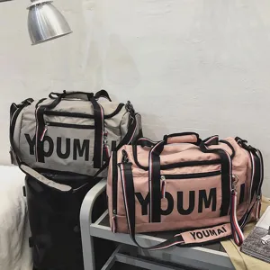 Large capacity travel duffel bag with wet dry separation for gym fitness sports and short trips.