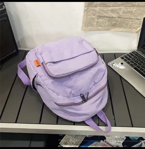 Casual purple canvas backpack for women and students, perfect daily retro casual school bag.