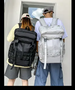 Detail view of large capacity street fashion backpack, durable multi-pocket design for daily use.