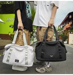 Large capacity travel duffel bag for short trips, lightweight waterproof gym fitness bag.