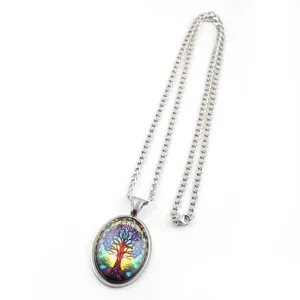 Close-up of a colorful Tree of Life necklace featuring an oval time gem pendant.