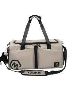 Grote sporttas voor fitness en reizen met nat-droog scheidingsvak in beige kleur.