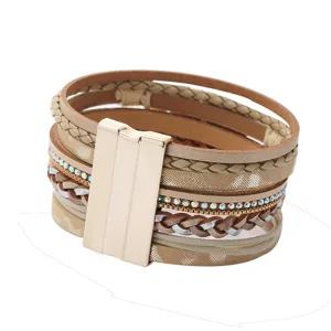 Multi-layer braided leather bracelet for women with chic magnetic clasp and sparkling rhinestones.