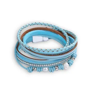 Multi-layer braided leather wrap bracelet with faux pearls rhinestones and magnetic clasp.
