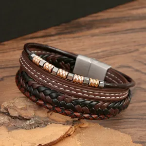 Men's multi-layer leather bracelet featuring braided bands, metal beads, and stainless steel clasp.
