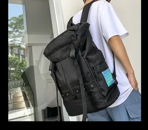 Stylish black large capacity street backpack for men and women, casual daily use.