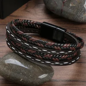 Multi-layer braided leather bracelet with magnetic clasp, stylish brown and black wristband.